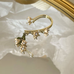 Puños para las orejas con borlas y flores de lirio de Fairycore