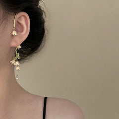 Puños para las orejas con borlas y flores de lirio de Fairycore