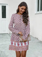 Ladies long sleeve tie-strap A-line dress with positioning print