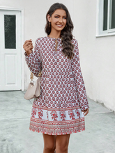 Ladies long sleeve tie-strap A-line dress with positioning print