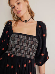 casual black dress with embroidered square collar and sunflowers