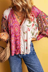 Camisa con mangas acampanadas y cuello con muescas y estampado floral multicolor