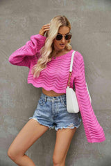 Suéter corto de manga larga y cuello redondo