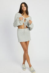 CÁRDIGAN TRANSPARENTE DE MANGA LARGA CON LAZO DELANTERO