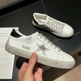 Zapatillas blancas de piel auténtica desgastada estilo vintage