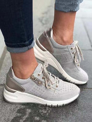 Zapatillas de cuña con cordones y cremallera lateral