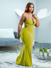 Vestido ajustado con escote en V profundo, espalda descubierta y lazo