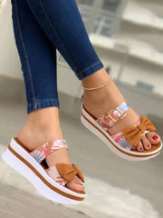 Sandalias con hebillas y decoración de lazo