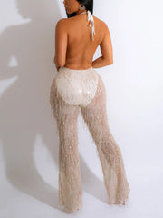 Mono con escote en V y lentejuelas y borlas