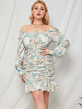 Vestido midi con mangas abullonadas y estampado floral