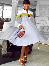 Vestido camisero con estampado de rayas y botones