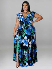 Vestido largo con abertura y cordones y mangas con volantes florales