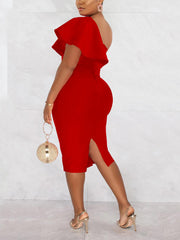 Vestido de noche con abertura y volante