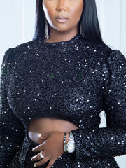 Vestido con lentejuelas y corte irregular