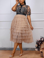 Vestido de tul con volantes y encaje