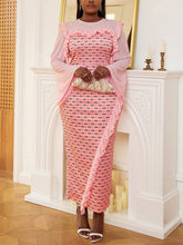 Vestido cruzado con mangas acampanadas y estampado de volantes