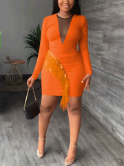 Minivestido de manga larga con borlas