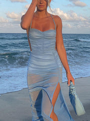 Vestido largo con abertura y cuello halter en color liso