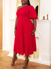 Vestido plisado con un hombro al descubierto y mangas abullonadas