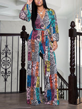 Jumpsuit mit V-Ausschnitt und weitem Bein und Schlangenmuster