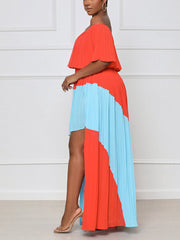 Vestido plisado con volantes y hombros descubiertos