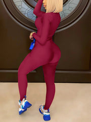 Figurbetonter Jumpsuit mit Reißverschluss vorne