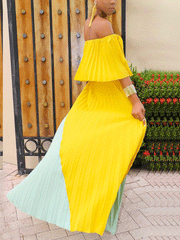 Vestido largo de gasa con hombros descubiertos y volantes