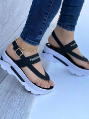 Sandalias de plataforma con hebillas y letras