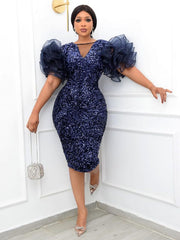 Elegante vestido de fiesta con escote en V y mangas abullonadas y lentejuelas