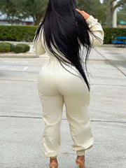 Mono con bolsillos y cordón con cremallera y escote en V profundo