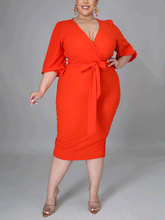 Vestido midi liso con escote en V profundo y abertura