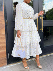 Elegantes gepunktetes Rüschenkleid