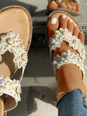 Sandalias planas con perlas y flores