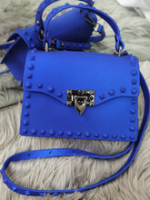 Cartera decorativa con remaches de gelatina