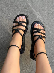 Sandalias planas con tiras anudadas