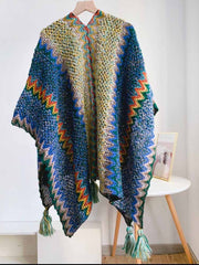 Poncho de punto con flecos