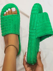 Sandalias planas con punta redonda y tejido de toalla