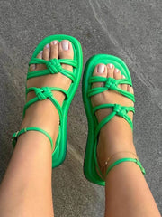 Sandalias planas con tiras anudadas