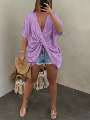 Top de escote en V con giro suelto