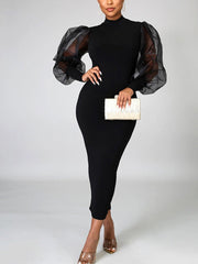 Vestido elegante de malla con mangas largas