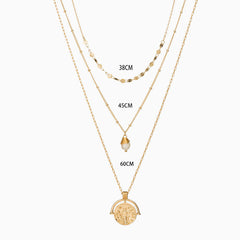 Mehrreihige Halskette mit Kettengliedern und Münzanhänger - Gold