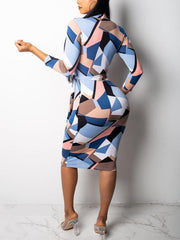 Vestido midi con estampado geométrico y cremallera en la parte delantera