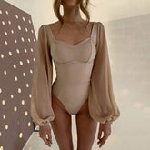 Body elegante de escote alto con mangas abullonadas y malla - Caqui