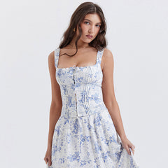 Top sin mangas con escote cuadrado, volantes y lazo en la parte delantera con estampado floral - Azul