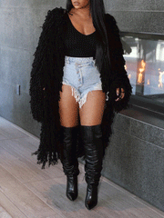 Suéter tipo cárdigan de punto con flecos