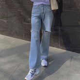 Vaqueros deshilachados de tiro alto con cortes retro y pierna recta - Azul claro