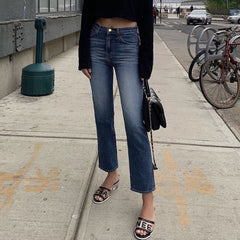 Vaqueros de tiro alto con efecto descolorido y pierna recta acampanada - Negro