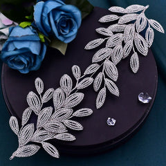 Diadema pequeña con adornos de diamantes de imitación y hojas brillantes - Plateado