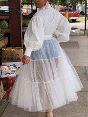 Vestido largo con parches de malla transparente