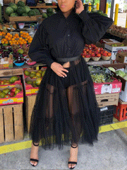 Vestido largo con parches de malla transparente